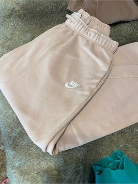Nike Light Pink Joggers with White Swoosh